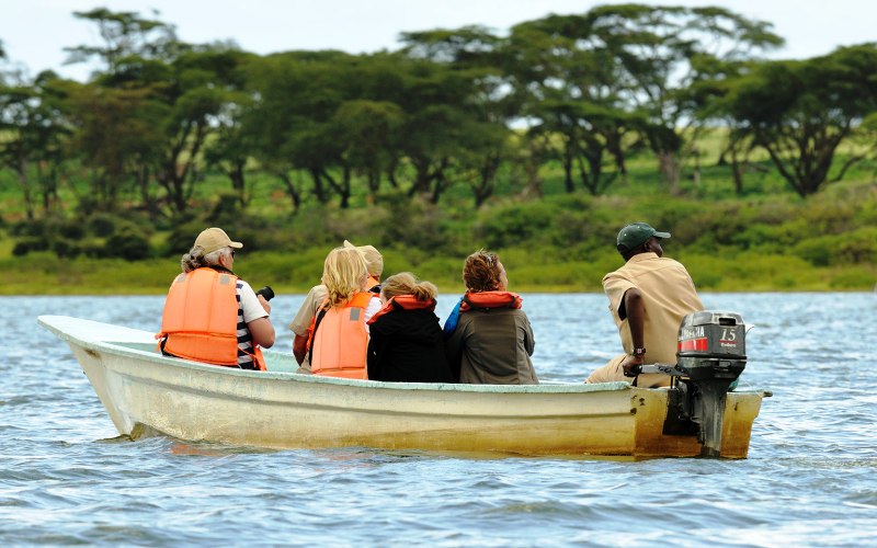 tourist-watching-sceneries-boatride-Lake-Naivasha